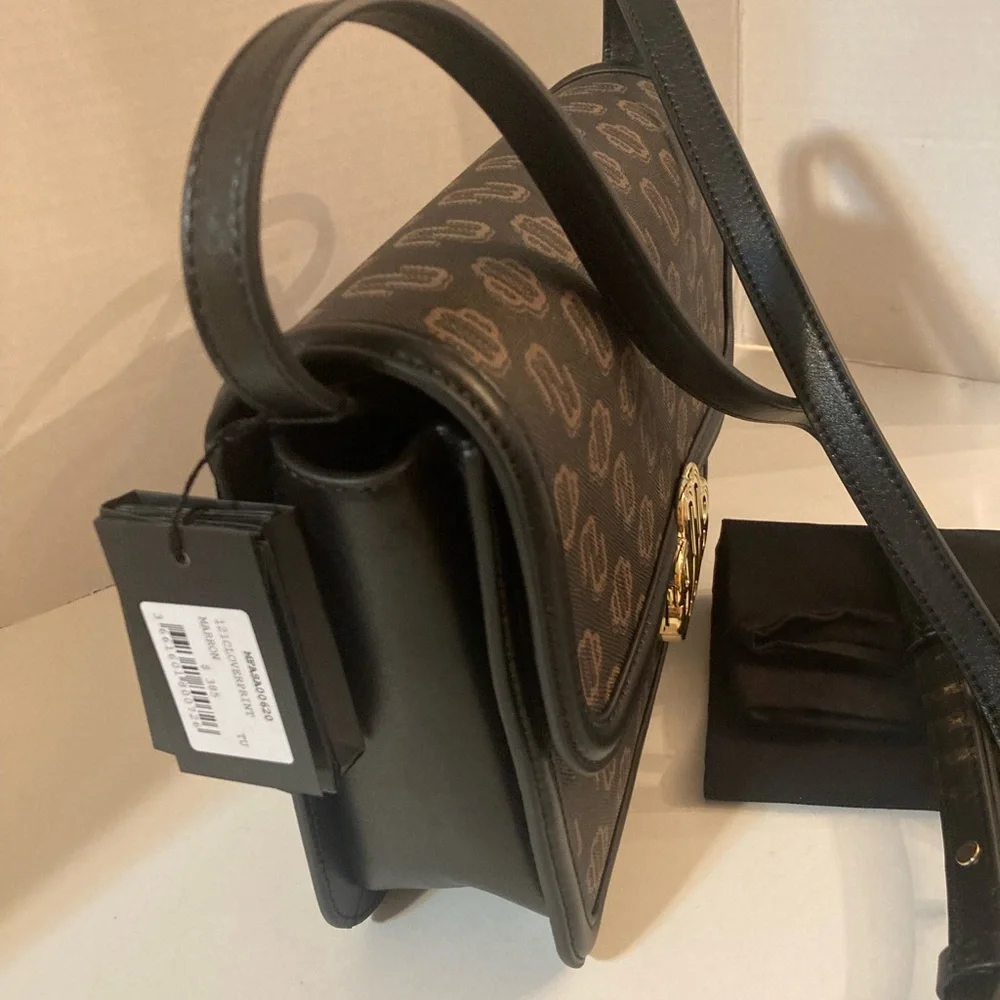 MAJE Clover Clasp Canvas Bag with Leather trim.